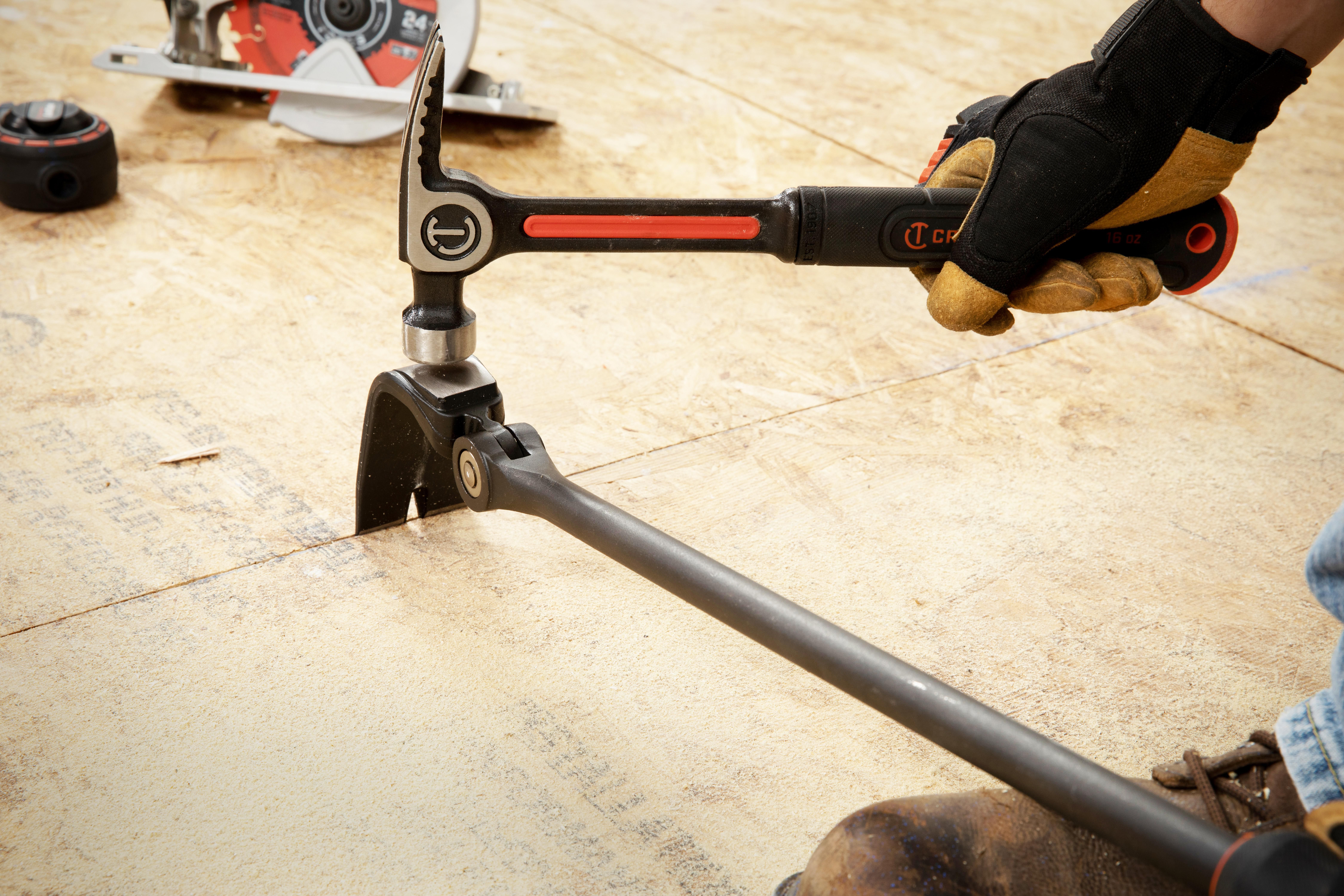 Crescent 30-in. Indexing Flat Pry Bar prying up flooring during demolition