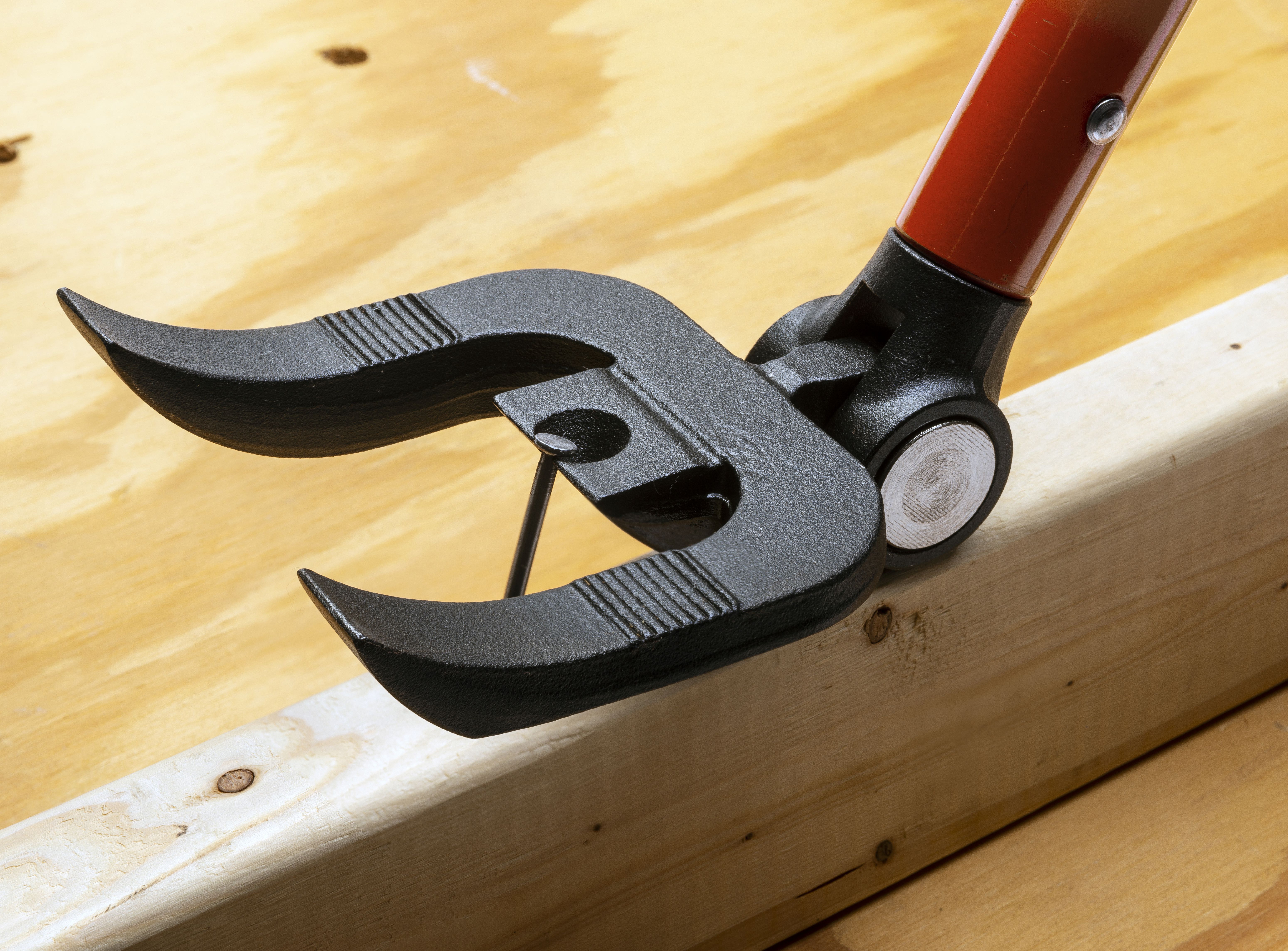 Crescent 44-in. Indexing Deck Removal Bull Bar being used to pull up a deck board