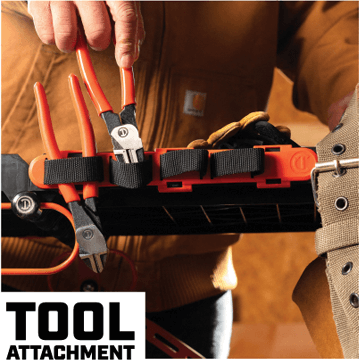 Man placing Crescent diagonal cutting pliers in the tool attachment webbing on the Crescent SITERUNNER cart